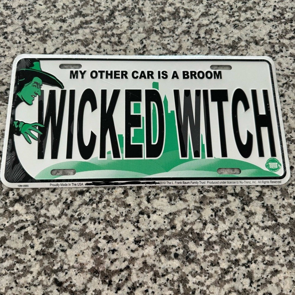 WICKED WITCH Embossed Metal License Plate Car‎ Auto Tag Sign 2010 Made In USA